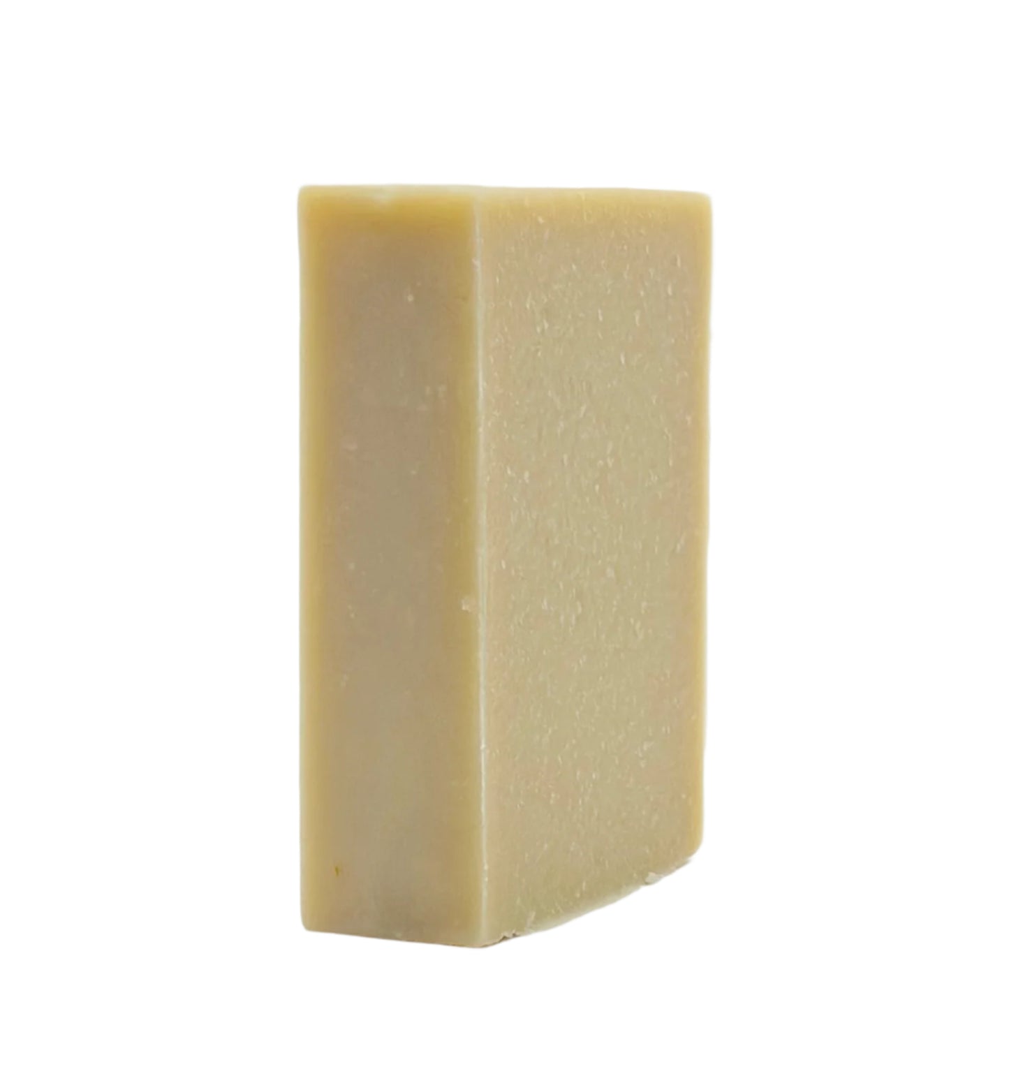 Side view of Cucumber Mint goat milk soap with natural color and smooth texture. Crafted by Clay & Goat Soap Co.